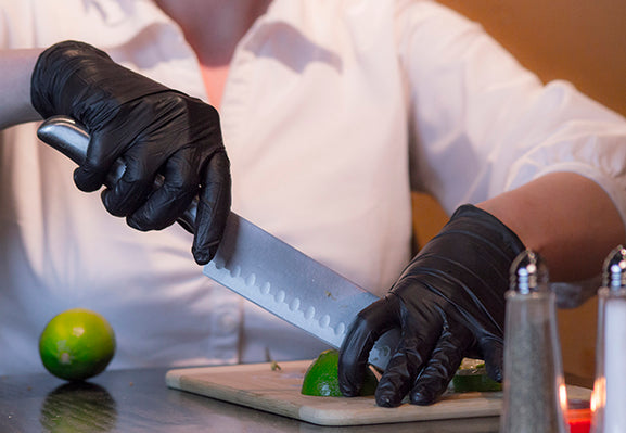 First Glove black nitrile food-safe gloves cutting limes